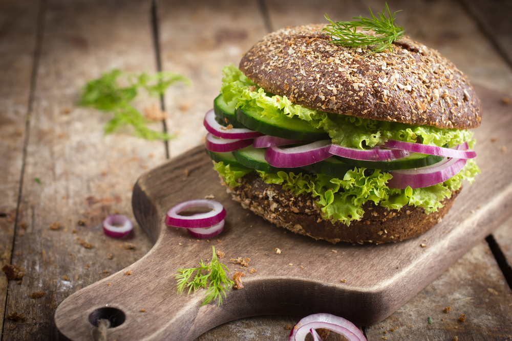 Vegan rye burger with fresh vegetables
